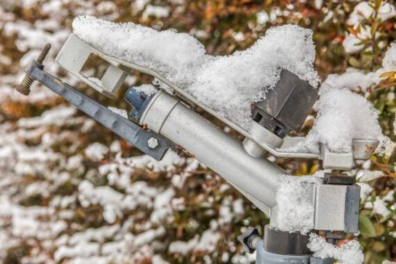 sprinkler head covered in frost