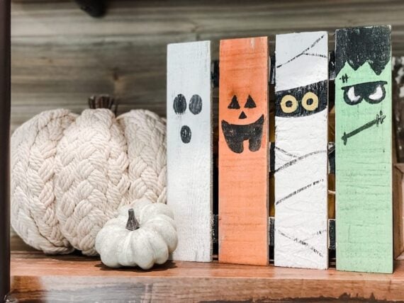 mini signs showing basic rectangular faces of halloween characters including a ghost, jack o lantern, mummy, and frankenstein